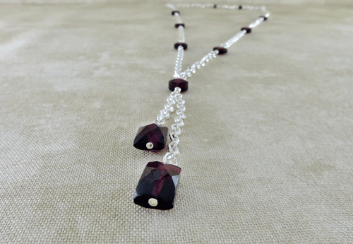 garnet necklace, January birthstone necklace, lariat necklace, y necklace, silver necklace, sterling necklace, gemstone necklace, gemstone jewelry, layering necklace, garnet jewelry, red necklace, Silver Echoes, minimalist necklace, minimalist jewelry, modern necklace, modern jewelry, simple necklace, simple jewelry, everyday necklace, everyday jewelry, dainty necklace, dainty jewelry, elegant necklace, Zen necklace, Zen jewelry, energy necklace, energy jewelry, Reiki necklace, Reiki jewelry, healing necklace, healing jewelry, chakra jewelry, chakra necklace, power jewelry, power necklace, handmade necklace, handmade jewelry, handcrafted necklace, handcrafted jewelry, artisan necklace, anniversary gift, Valentines gift, birthday gift, anniversary gift, Christmas gift, gifts for her, Mother’s day gift, wedding gift, wedding necklace, wedding jewelry, bridesmaid necklace, bridesmaid jewelry, bridal necklace, bridal jewelry, flower girl necklace, flower girl jewelry, mother of the bride necklace, mother of the bride jewelry