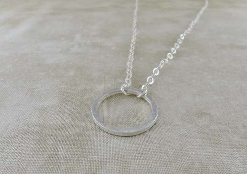 silver necklace, sterling silver necklace, sterling necklace, slender necklace, circle necklace, silver chain necklace, layering necklace, layering jewelry, everyday necklace, hammered silver necklace, Silver Echoes, minimalist necklace, minimalist jewelry, modern necklace, modern jewelry, simple necklace, simple jewelry, everyday necklace, everyday jewelry, spiritual necklace, spiritual jewelry, elegant necklace, Zen necklace, Zen jewelry, energy necklace, energy jewelry, Reiki necklace, Reiki jewelry, healing necklace, healing jewelry, chakra jewelry, chakra necklace, power jewelry, power necklace, handmade necklace, handmade jewelry, handcrafted necklace, handcrafted jewelry, artisan necklace, artisan jewelry, wedding necklace, wedding jewelry, bridesmaid necklace, bridesmaid jewelry, bridal necklace, bridal jewelry, New Year’s gift, Valentines gift, birthday gift, Mother’s Day gift, anniversary gift, Christmas gift, gifts for her, Kwanza gift, Hanukah gift, mother of the bride necklace, mother of the bride jewelry