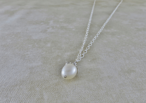 pearl necklace, pearl jewelry, silver necklace, sterling silver necklace, sterling necklace, gemstone necklace, gemstone jewelry, layering necklace, layering jewelry, June birthstone, birthstone necklace, Silver Echoes, minimalist necklace, minimalist jewelry, modern necklace, modern jewelry, simple necklace, simple jewelry, everyday necklace, everyday jewelry, dainty necklace, dainty jewelry, elegant necklace, Zen necklace, Zen jewelry, energy necklace, energy jewelry, Reiki necklace, Reiki jewelry, healing necklace, healing jewelry, chakra jewelry, chakra necklace, power jewelry, power necklace, handmade necklace, handmade jewelry, handcrafted necklace, handcrafted jewelry, artisan necklace, artisan jewelry, Valentines gift, birthday gift, anniversary gift, Christmas gift, gifts for her, Mother’s day gift, wedding gift, wedding necklace, wedding jewelry, bridesmaid necklace, bridesmaid jewelry, bridal necklace, bridal jewelry, flower girl necklace, flower girl jewelry, mother of the bride necklace, mother of the bride jewelry