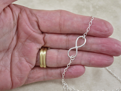 infinity necklace, silver necklace, sterling necklace, silver chain necklace, slender necklace, layering necklace, eternity necklace, friendship necklace, tiny necklace, best friend necklace, sweetheart necklace, modern necklace, Silver Echoes Zen necklace, peace necklace, power necklace, healing necklace, chakra necklace, artisan necklace, everyday necklace, lightweight necklace, elegant necklace, statement necklace, bridesmaid gift, flower girl necklace, flower girl gift, infinity jewelry wedding necklace, wedding gift, anniversary gift, birthday gift, Christmas gift, Hanukah gift, Kwanza gift, Valentine’s gift, Valentines gift, Mother’s Day gift, mothers day gift, gifts for her, bridesmaid necklace, wedding necklace, bridal necklace