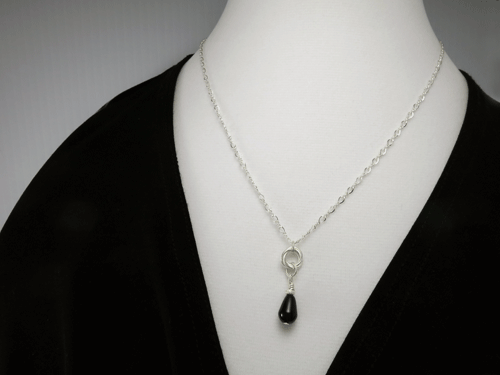 onyx necklace, silver necklace, pendant necklace, sterling necklace, layering necklace, teardrop onyx necklace, teardrop pendant, gemstone necklace, wire wrap necklace, everyday necklace, gemstone jewelry, black necklace, Silver Echoes minimalist necklace, minimalist jewelry, modern necklace, modern jewelry, simple necklace, simple jewelry, everyday jewelry, dainty necklace, dainty jewelry, elegant necklace, elegant jewelry, handmade necklace, handcrafted necklace artisan necklace, artisan jewelry, Zen necklace, Zen jewelry, healing necklace, healing jewelry, power necklace, power jewelry, Reiki necklace, Reiki jewelry, chakra necklace, chakra jewelry, bridesmaid gift, bridesmaid necklace, wedding necklace engagement gift, wedding jewelry, bridal necklace, New Years gift, Christmas gift, Valentines gift, birthday gift, mother’s day gift, mothers day gift, Kwanza gift, Hanukah gift, anniversary gift, gifts for her, gifts for women, wedding gift