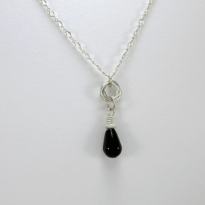 onyx necklace, silver necklace, pendant necklace, sterling necklace, layering necklace, teardrop onyx necklace, teardrop pendant, gemstone necklace, wire wrap necklace, everyday necklace, gemstone jewelry, black necklace, Silver Echoes minimalist necklace, minimalist jewelry, modern necklace, modern jewelry, simple necklace, simple jewelry, everyday jewelry, dainty necklace, dainty jewelry, elegant necklace, elegant jewelry, handmade necklace, handcrafted necklace artisan necklace, artisan jewelry, Zen necklace, Zen jewelry, healing necklace, healing jewelry, power necklace, power jewelry, Reiki necklace, Reiki jewelry, chakra necklace, chakra jewelry, bridesmaid gift, bridesmaid necklace, wedding necklace engagement gift, wedding jewelry, bridal necklace, New Years gift, Christmas gift, Valentines gift, birthday gift, mother’s day gift, mothers day gift, Kwanza gift, Hanukah gift, anniversary gift, gifts for her, gifts for women, wedding gift