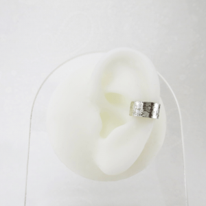 Sterling silver ear cuff showcasing modern elegance and minimalist design.
