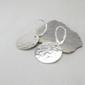 Hammered Harmony: Sterling silver earrings with hammered discs and lever back ear wires.